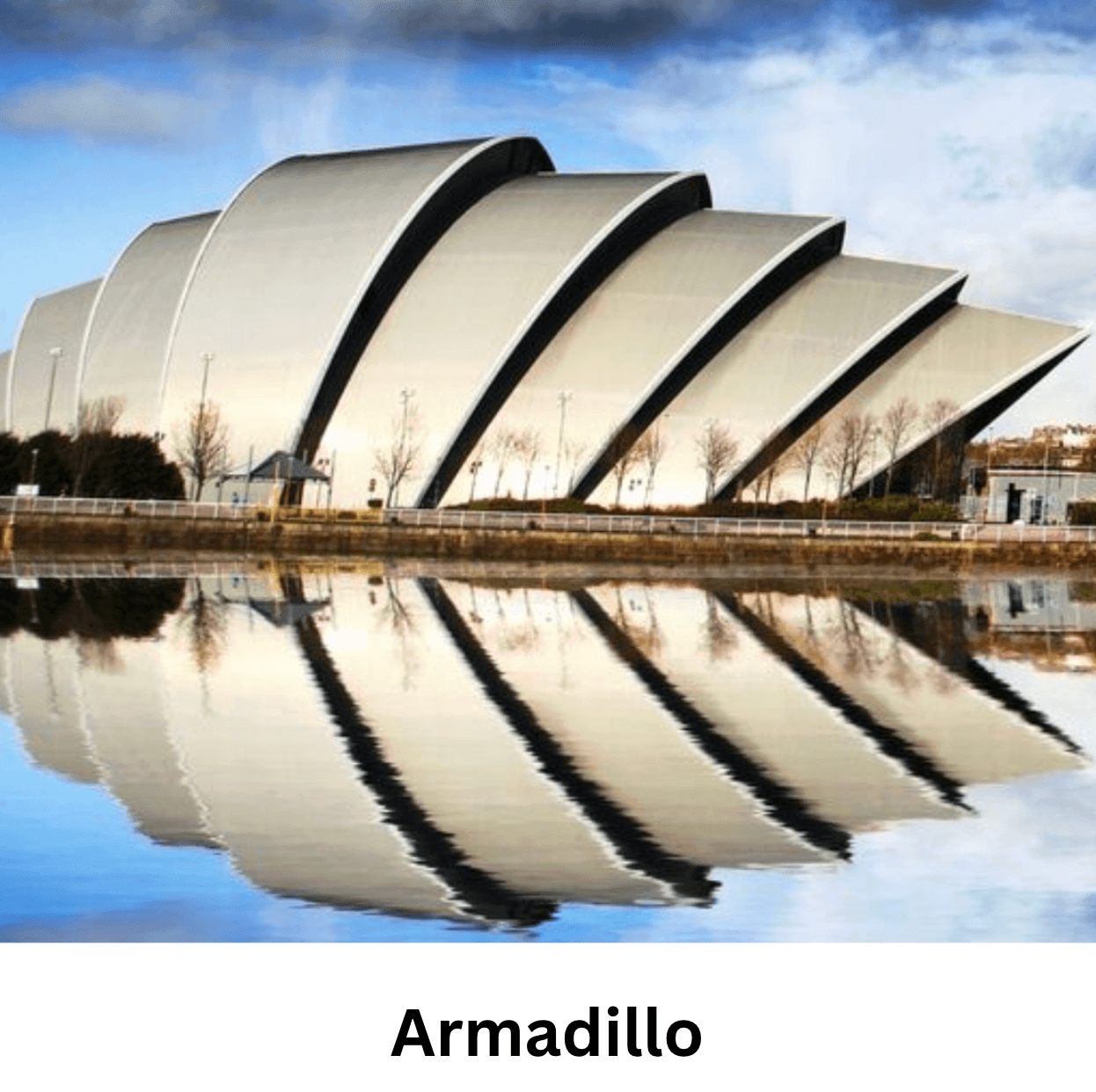 Distinctive tiered architecture of the SEC Armadillo building reflected in the calm River Clyde.