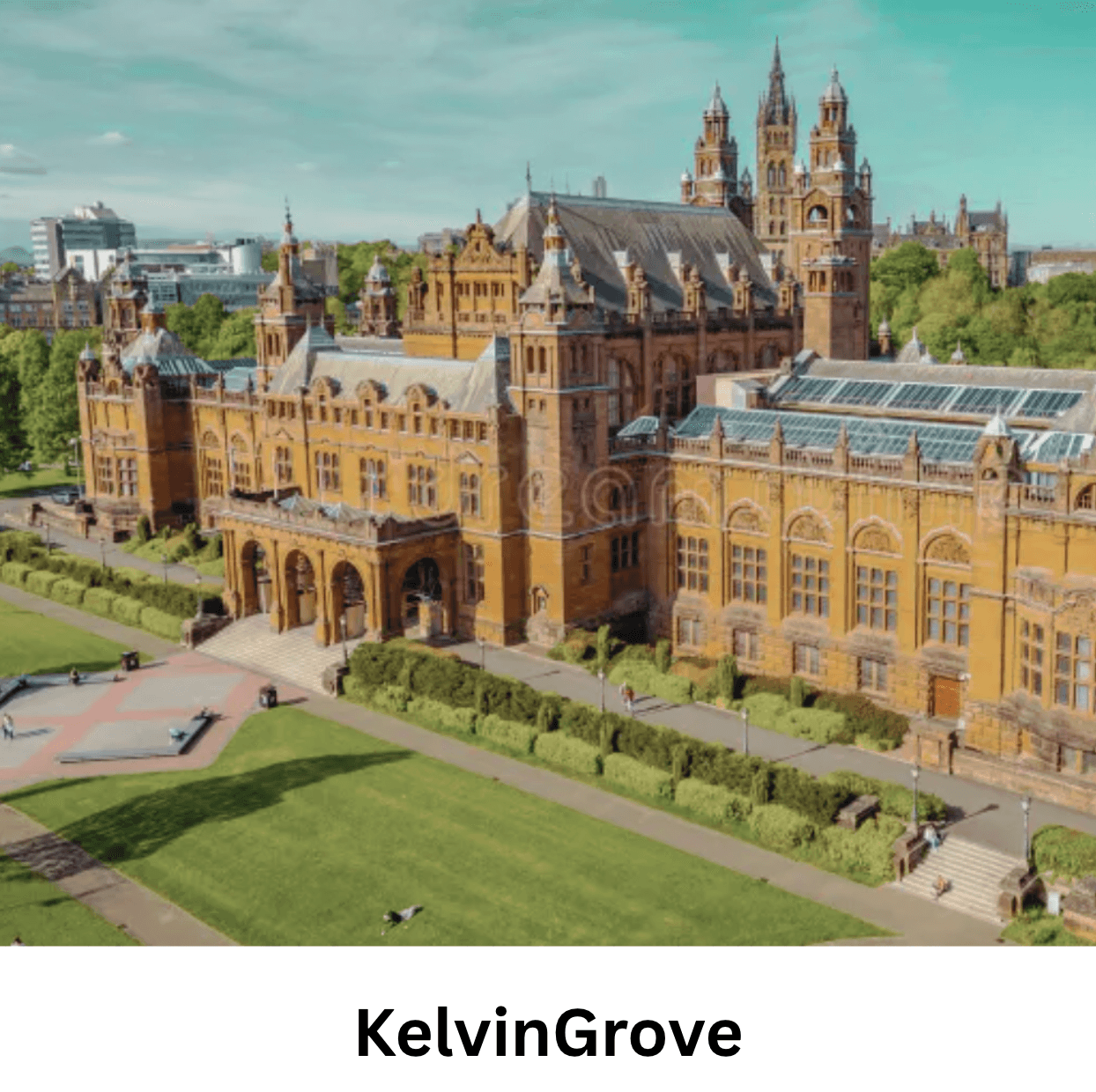Ornate red sandstone Kelvingrove Art Gallery and Museum building in Glasgow surrounded by green parkland.